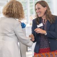 Erica Hamilton receiving her bag